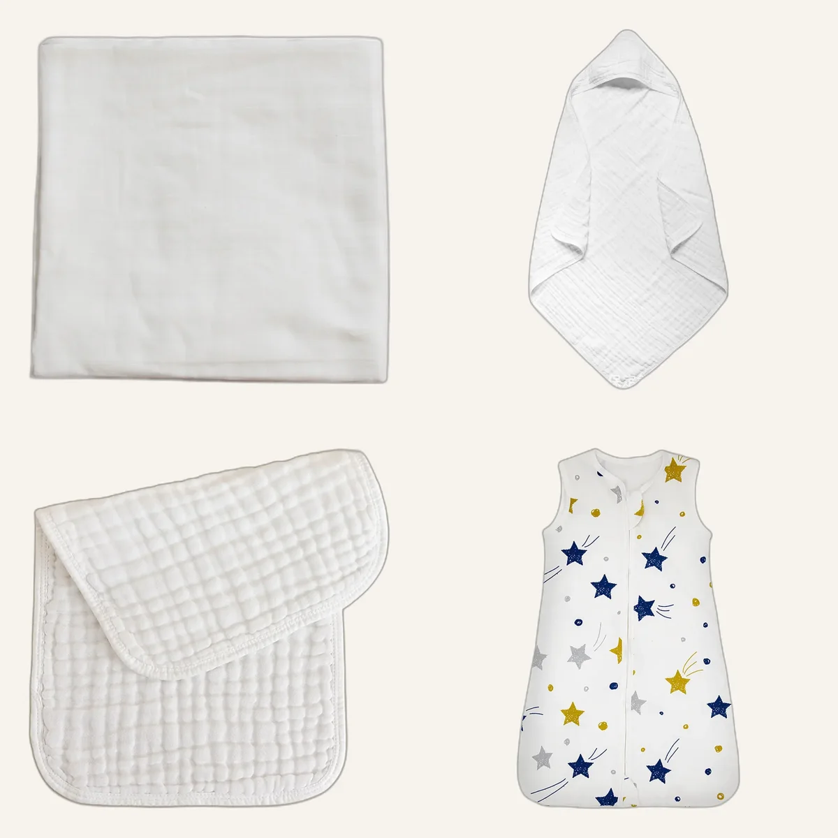 Baby shower gift box: white swaddle, hooded towel, muslin cloths and sleep sack