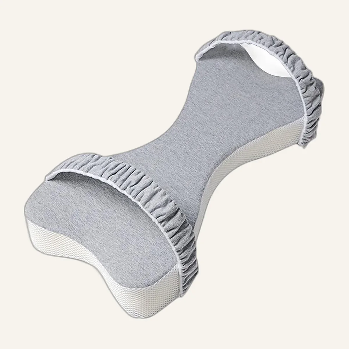 Grey contoured knee pillow with elastic strap