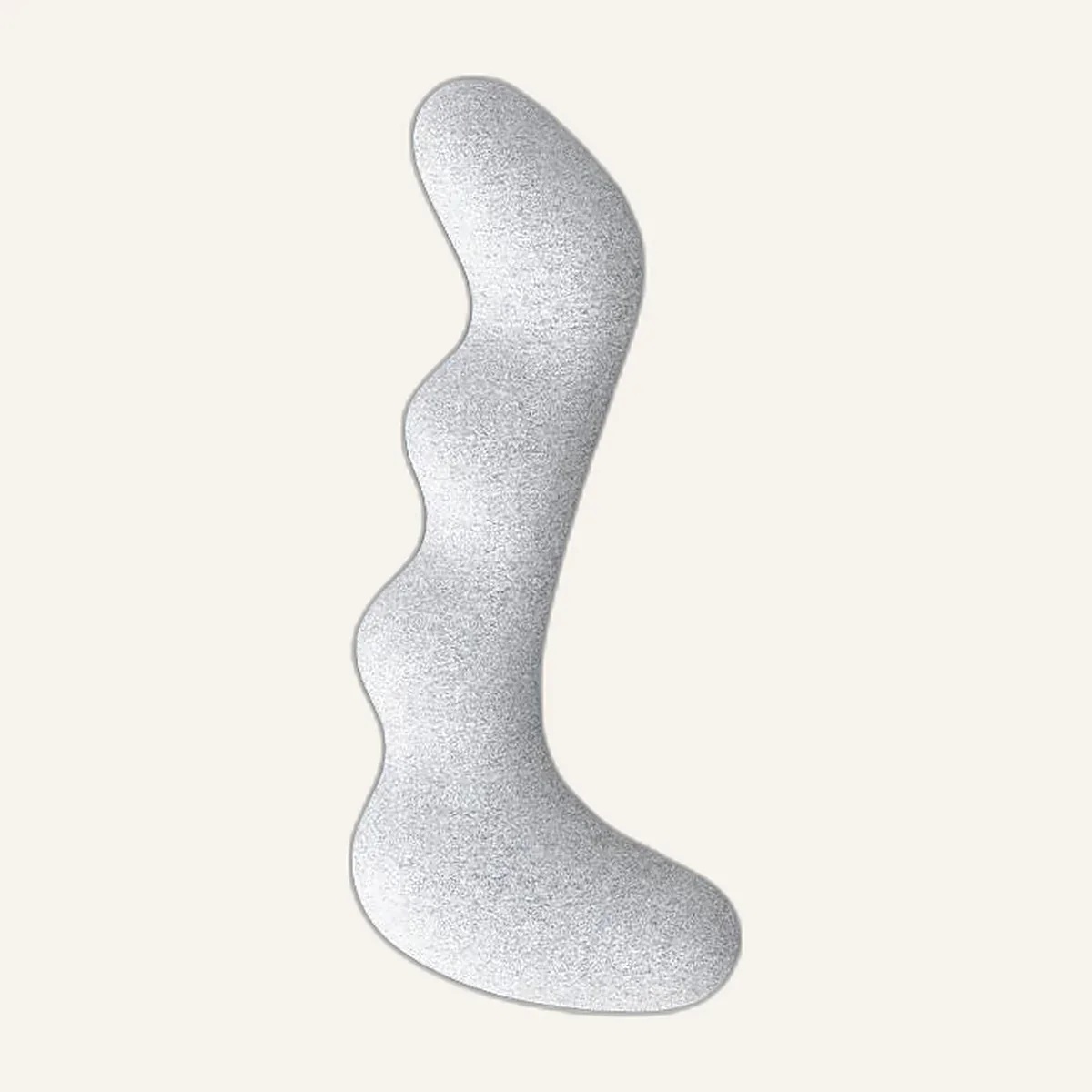 Long white memory foam body pillow with a wave shape