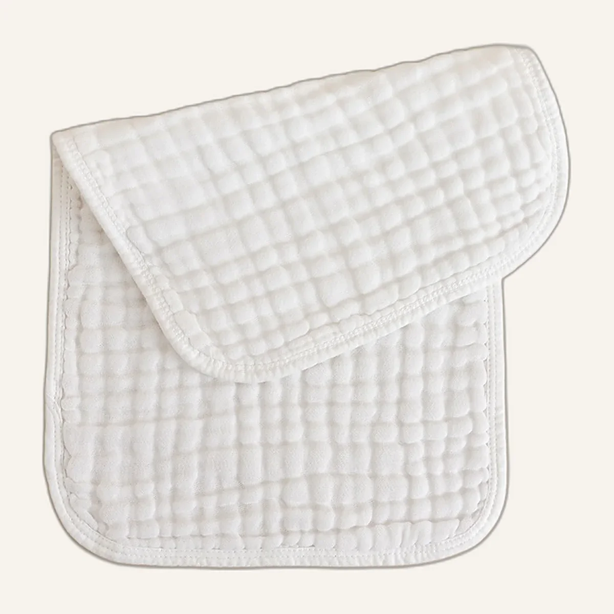White six-layer muslin burp cloth folded